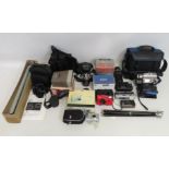 A collection of various camera & video equipment including cameras Pentax MG with 50mm lens,