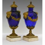 Pair of late 19th century French cobalt blue glass and ormolu mounted covered vases