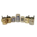 Group of early 20th century German stoneware steins and mugs
