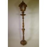 Antique carved giltwood torchere with lantern top, 203cm high