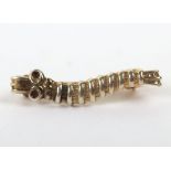 A Second World War 1944 Bomber Command Caterpillar Club Badge.