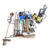 Collection of garden tools along with Ecoh strimmer