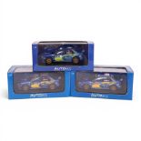 Three Auto Art 1:32 scale slot racing cars