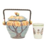 A Carltonware biscuit barrel and cover.