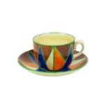 A Clarice Cliff Original Bizarre pattern tea cup and saucer.