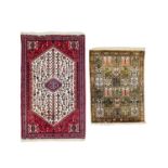 An Iranian handknotted silk prayer mat.