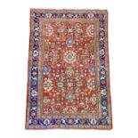 A Persian Mahal carpet.