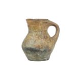 An English medieval pottery jug.