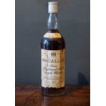 A bottle of Macallan 1956 'Pure Highland Malt Scotch Whisky'.
