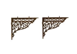 A pair of Victorian cast iron shelf brackets.