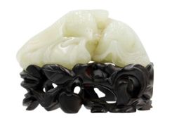 A Chinese carved celadon jade group of quail, Qing Dynasty, 18th/19th century.