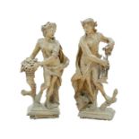 A pair of continental linden wood figures.