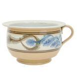 A late 19th century mocha ware chamber pot.