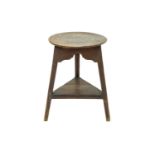 An ash and elm circular cricket table.