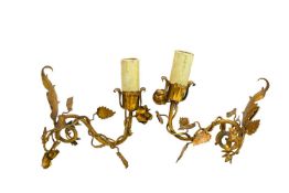 Four gilt metal single branch wall lights.