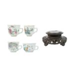 Four Chinese porcelain famille rose cups.