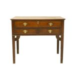 A George III oak side table.