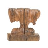 A carved oak candelabrum.