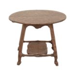 An unusual carved oak two tier side table.