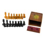 A Jacques Staunton weighted boxwood and ebony part chess set.