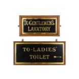 A glass sign 'To Gentlemen's Lavatory'.