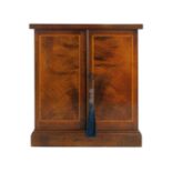 A Victorian figured walnut table top collector's cabinet.
