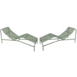 A pair of Hay 'Palissade Chaise Longue' sun loungers in the 'Olive' green colourway.