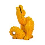 A Burmantofts grotesque pottery dragon figure.