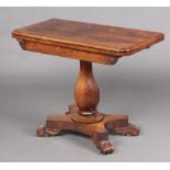 A William IV rosewood card table, raised on a turned column with triform base and scrolled feet 71cm