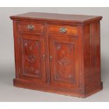 An Edwardian walnut chiffonier fitted 2 short drawers above double cupboard enclosed by panelled
