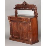A Victorian rosewood chiffonier, the raised mirrored back fitted a shelf above 1 long drawer and
