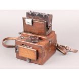 A 1920s Houghton-Butcher Ensign 120 Roll Film Reflex Tropical SLR camera, appears to have bespoke