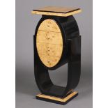 A Koefoed style Art Deco figured walnut and ebonised pedestal chest of 4 drawers, raised on a shaped
