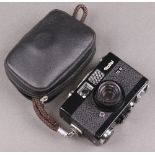 A Rollei 35B 35mm compact camera, fitted an Triotar 3.5/4.0mm lens with Hoya filter together with