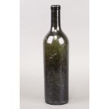 An 18th/19th century olive green wine bottle 30cm