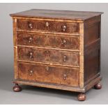 A Queen Anne oak lined chest of 3 long drawers in two sections, with walnut oyster veneers and inlay