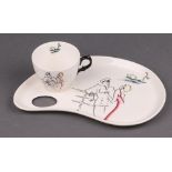 A 1930's Clarice Cliff Cruiseware Palette plate and cup, the oval plate with thumb hole and recess