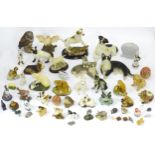 A quantity of assorted models of animals / birds to include cats, dogs, owls, squirrels, foxes, etc,