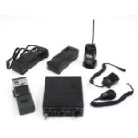 A VHF marine radio transceiver with two handsets, together with two portable CB radios. The