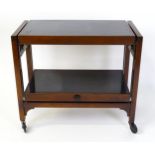A mid 20thC Besway metamorphic trolley / table, approx 30 1/2" wide x 26 1/2" high x 15" deep Please