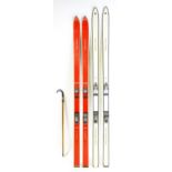 Two pairs of skis by Fischer and Sturmann, together with an alpine walking stick. The largest approx