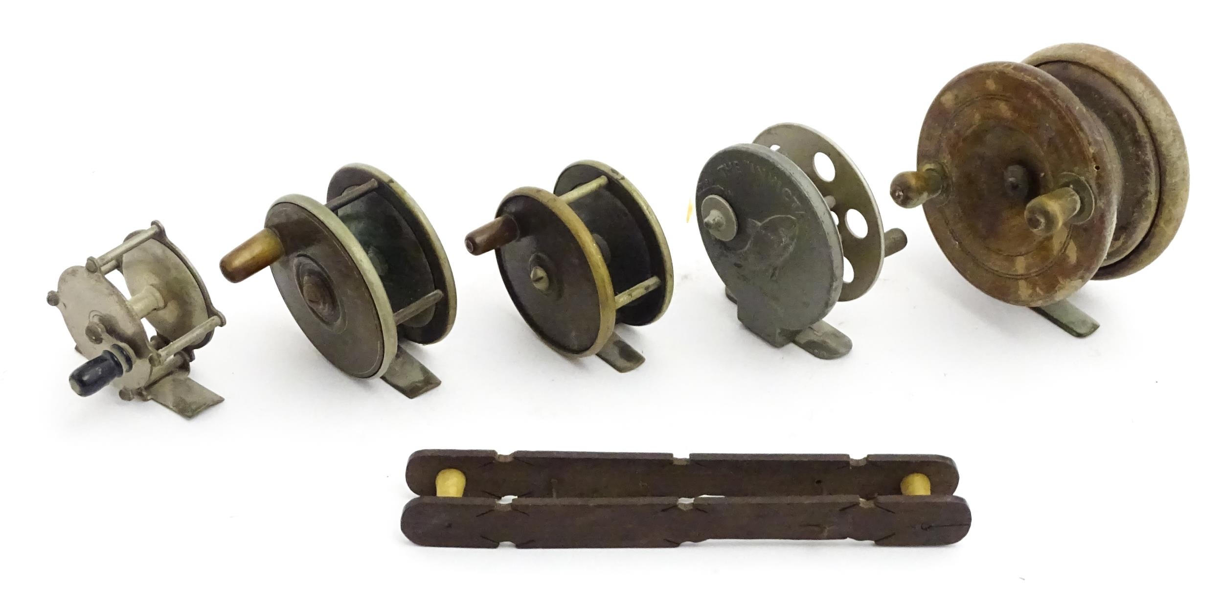 Five early to mid 20thC centrepin fishing reels. To include an aluminium example marked 'The