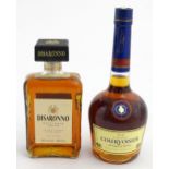A 70cl bottle of Courvoisier cognac brandy. Together with a 500ml bottle of Disaronno liqueur. (2)