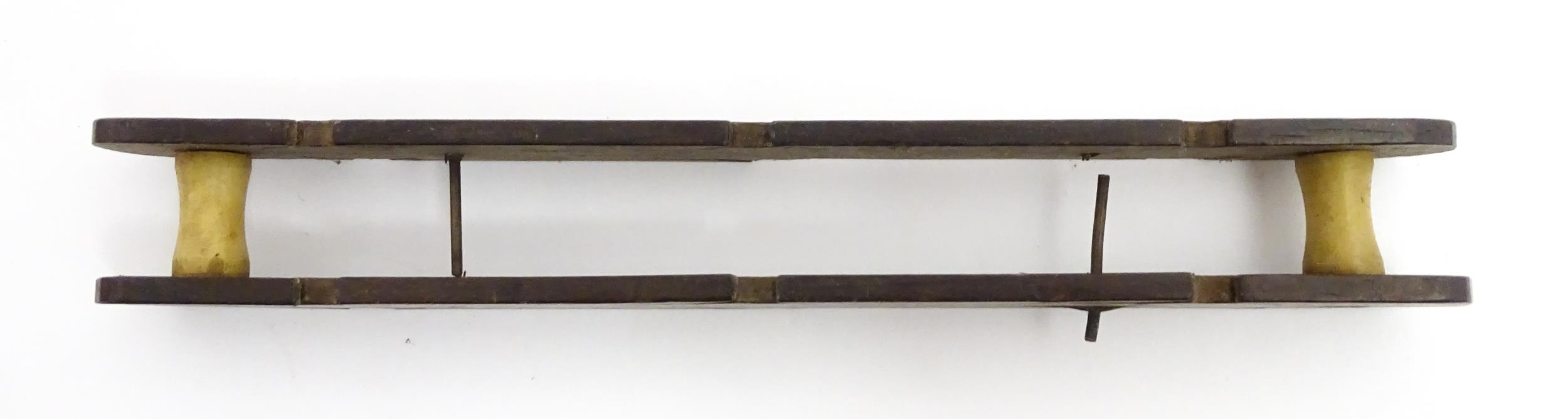 Five early to mid 20thC centrepin fishing reels. To include an aluminium example marked 'The - Image 12 of 13