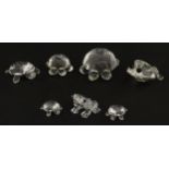 Five Swarovski crystal models of turtles, and two frogs. The largest approx. 2 1/4" long (7)