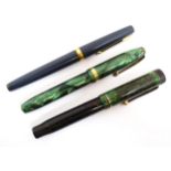 A Parker, England 'Duofold' fountain pen with 14k gold nib and green celluloid decoration.