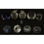 A quantity of Swarovski crystal paperweights. Together with two Swarovski crystal pot and covers