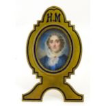 A 19thC portrait miniature by Edward Tayler (1828-1906) depicting a young lady wearing a lace bonnet