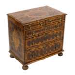 A 17thC and later oyster veneered walnut and laburnum chest of drawers with a moulded top and front