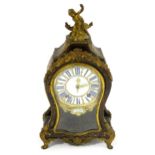 An 18thC French tortoiseshell boulle work bracket clock with twelve-piece enamel cartouche dial with